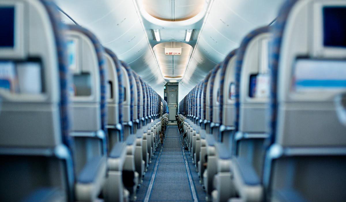 Rows of empty airplane seats