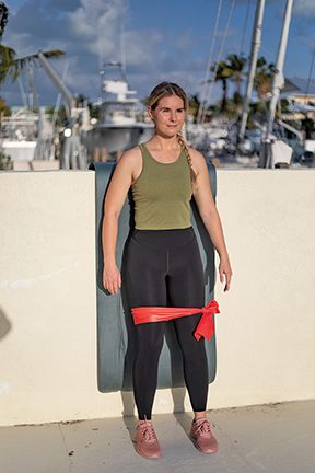 dive fitness stretch - start with standing against wall