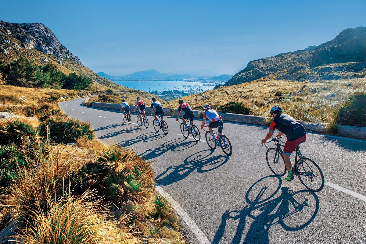 group of triathlete on bicycle ride on the road