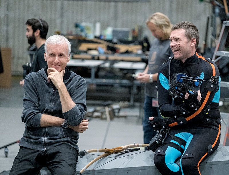 Director James Cameron enjoys a lighthearted moment with actor Sam Worthington