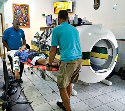 paralyzed patient receiving treatment