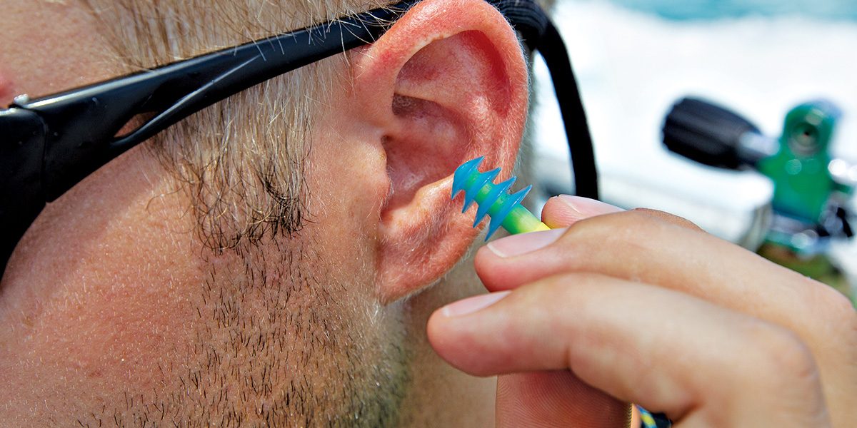Inserting earplug