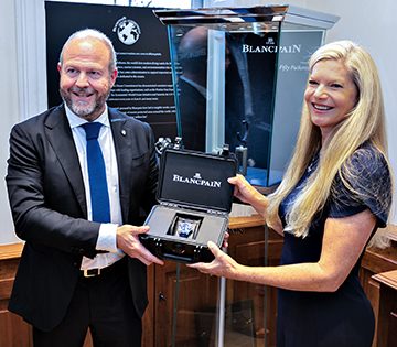 Andrea Caputo of Blancpain presents Renee with the inaugural Female Fifty Fathoms Award watch