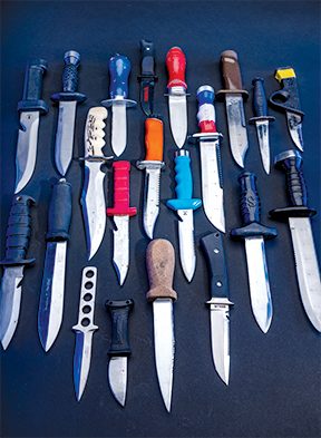An assortment of vintage dive knives