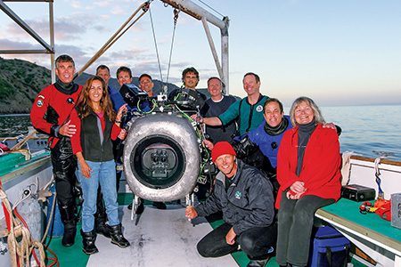 Howard and Michele Hall are pictured with their crew