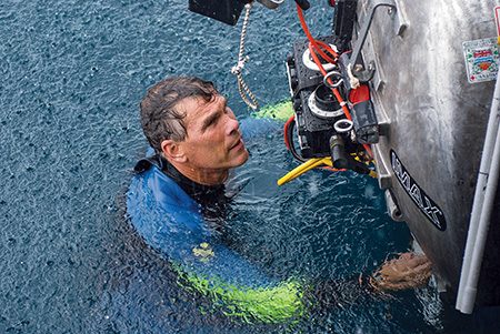 Howard Hall films rain on the ocean’s surface in Papua New Guinea