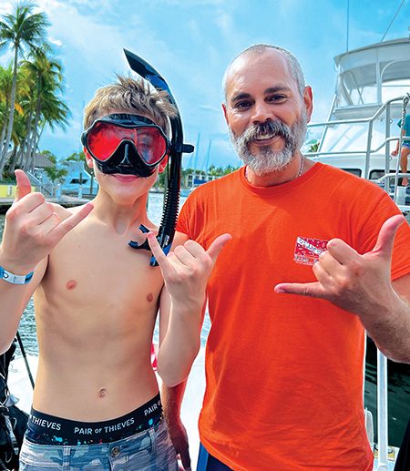 Caden Everhart with instructor George Katcher