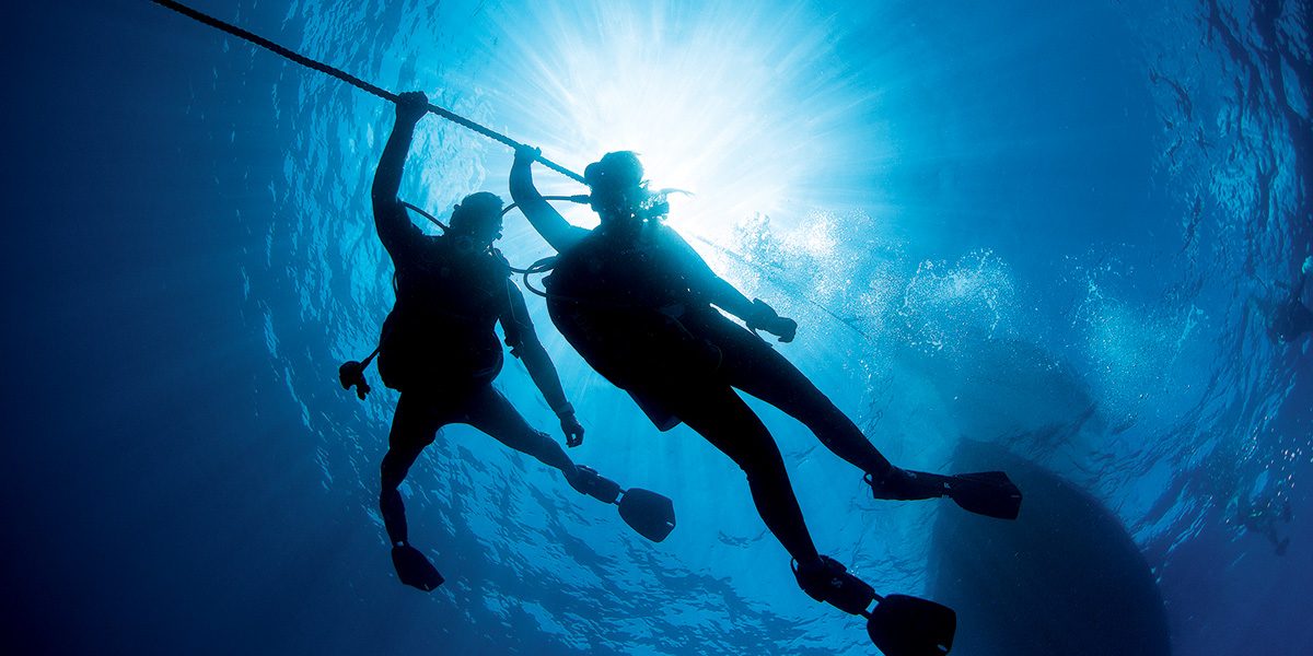 Two divers during a safety stop