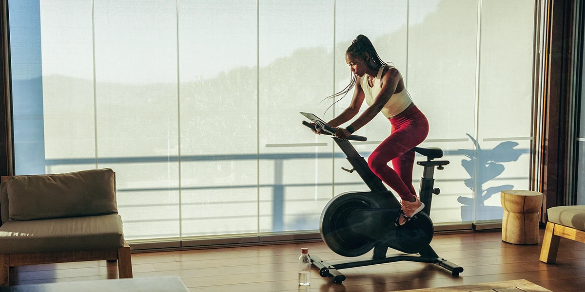 woman on cycle machine