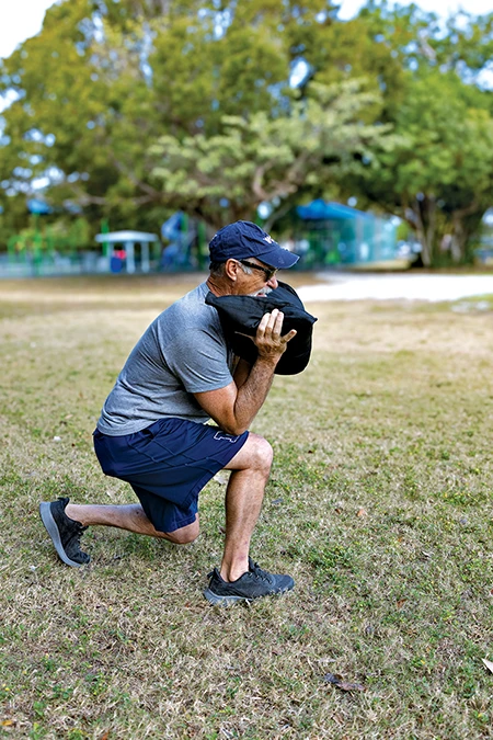 Sandbag Reverse Lunges