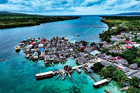 At Wakatobi, the resort and the local village of Lamanggau.