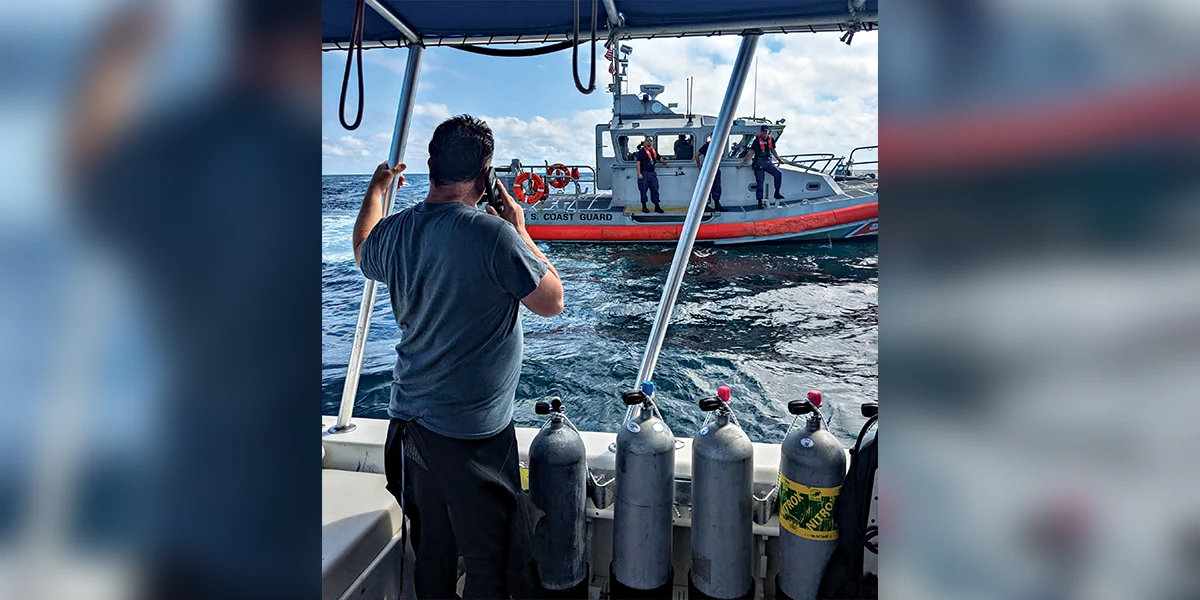 After being lost for six hours, the author speaks to his wife as the Coast Guard arrives.