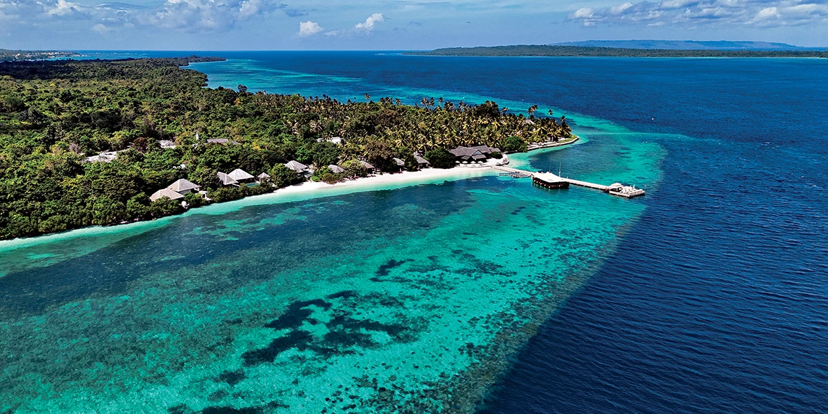Aerial view of the Wakatobi Resort and house reef.