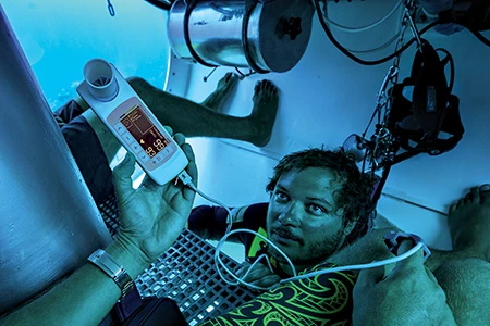 Dugrenot checks physiological measurements in Under the Pole’s Capsule