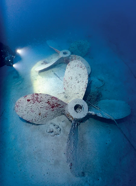 Two propellers rest on the seafloor at 225 feet (69 meters) near the stern of the wreck.