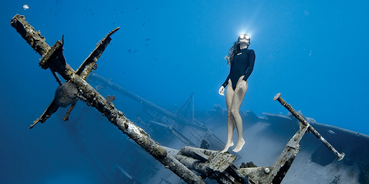 Freediver on sunken ship