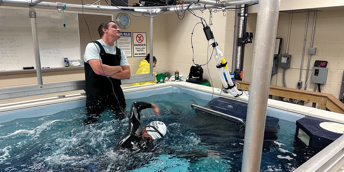 Ben Skutnik, PhD, collects data on swimming in cold water.